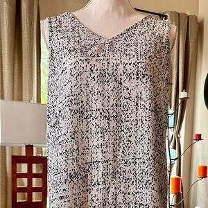 Woman’s lite weight polyester sleeveless blouse